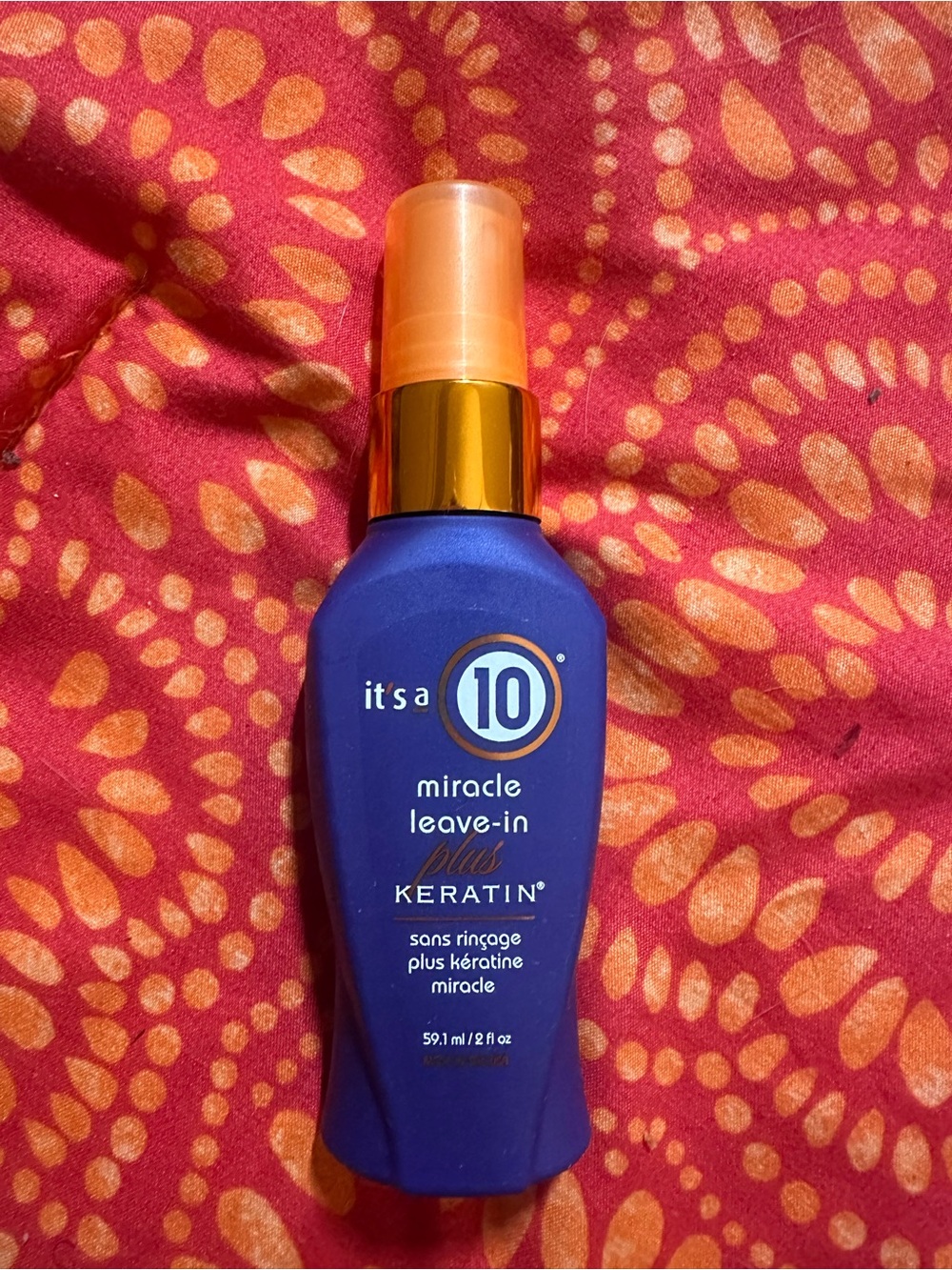 It’s a 10 Miracle Leave-In Plus Keratin Spray – Blue/Orange travel size 2oz